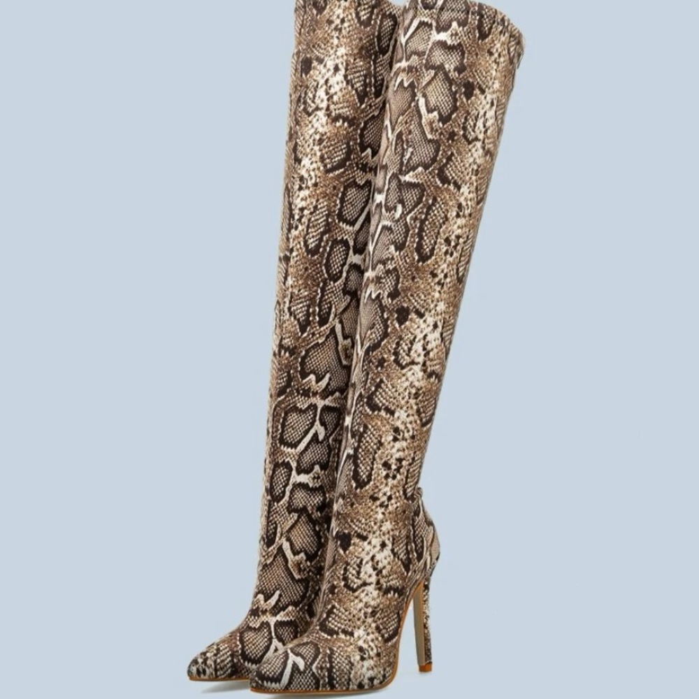 Snake skin thigh high boots